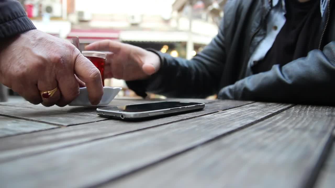 Video Stock Person Using A Mobile Phone While Drinking Tea Live Wallpaper Free