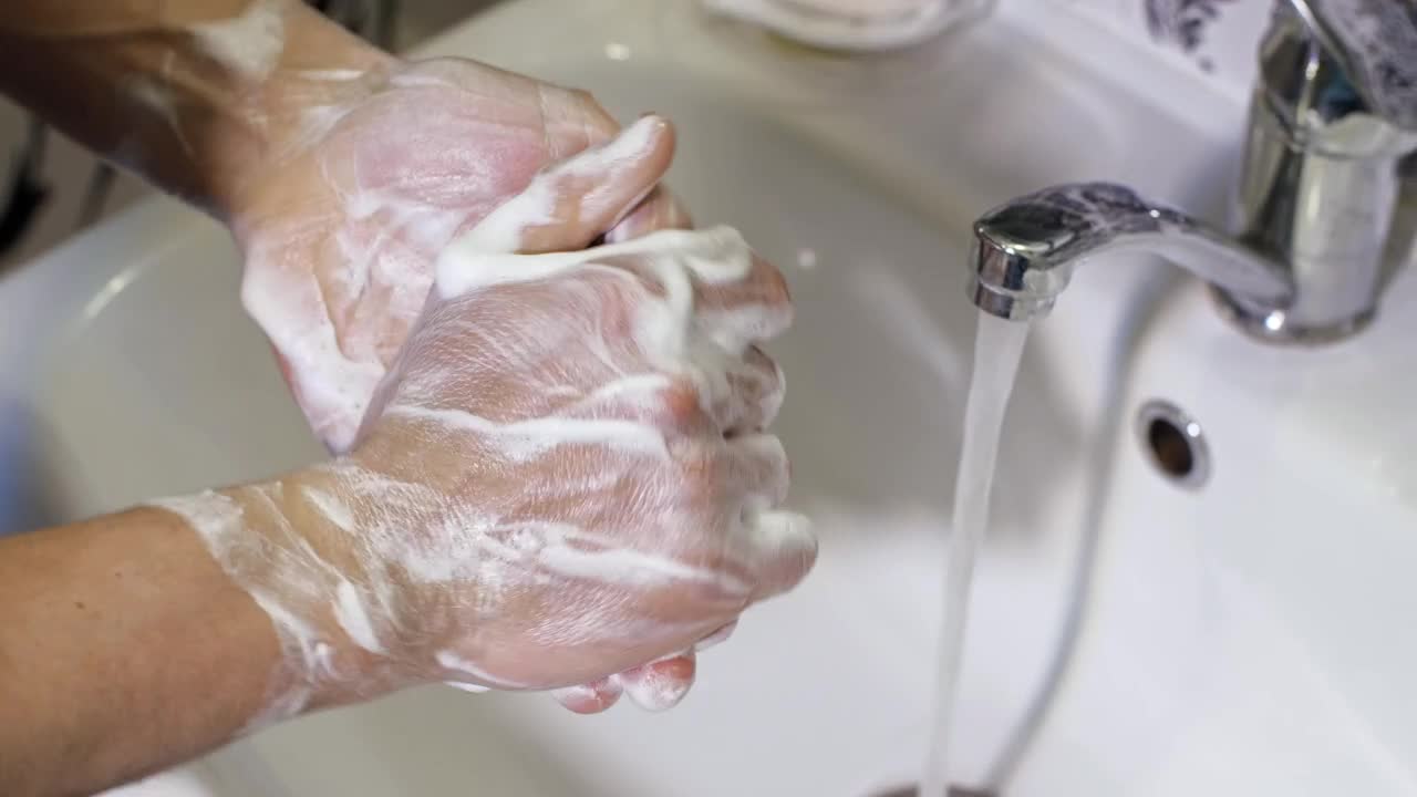 Video Stock Person Washing Their Hands In The Bathroom Live Wallpaper Free