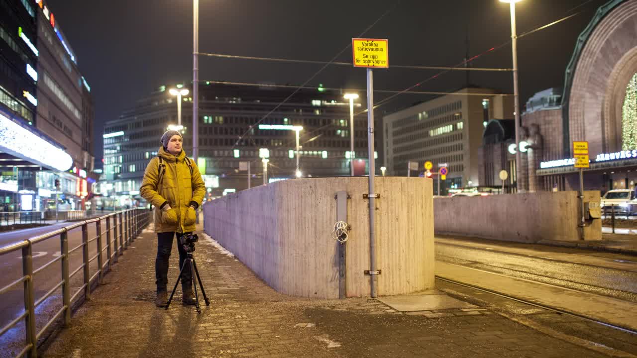 Video Stock Photographer Standing By A Tram Line Live Wallpaper Free