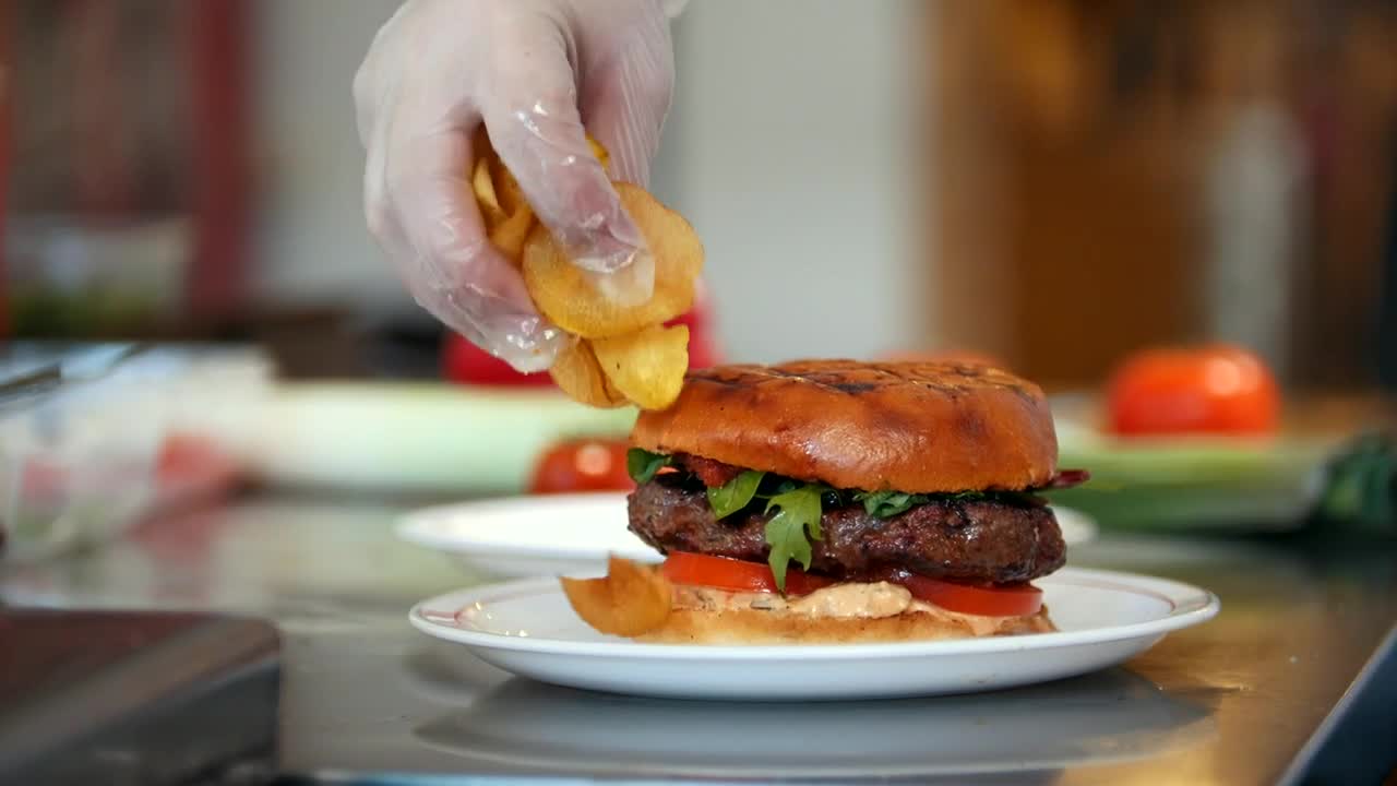 Video Stock Placing French Fries On A Plate With A Hamburger Live Wallpaper Free