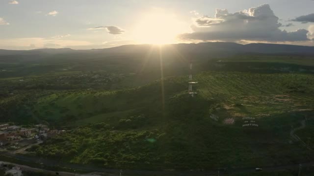 Video Stock Plateau In The Middle Of A Large Meadow Aerial Shot Live Wallpaper Free