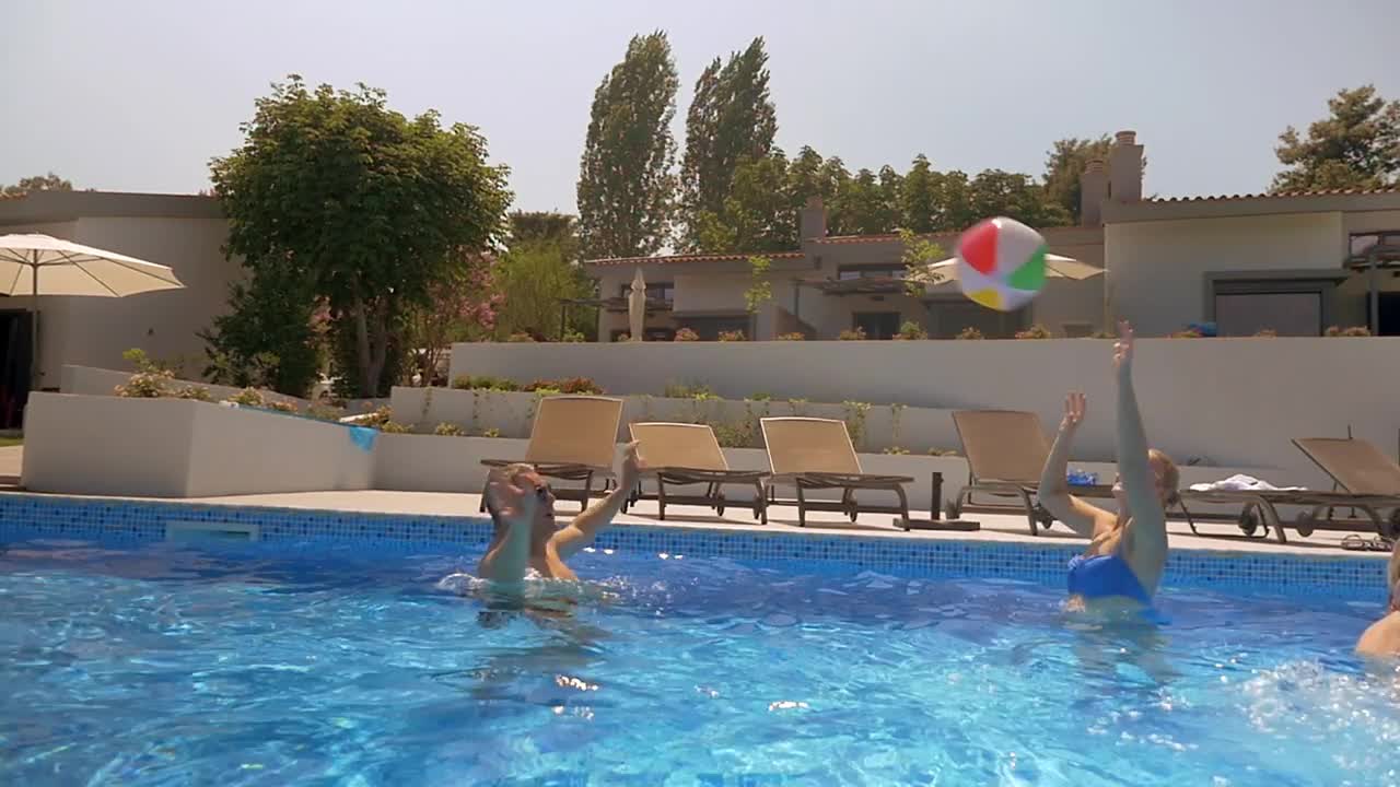 Video Stock Playing With A Large Ball In The Pool  LargeLive Wallpaper Free