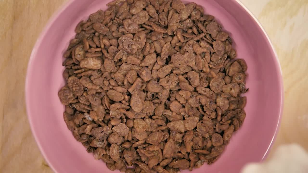Video Stock Pouring Milk Into A Bowl With Healthy Cereal 41134Live Wallpaper Free