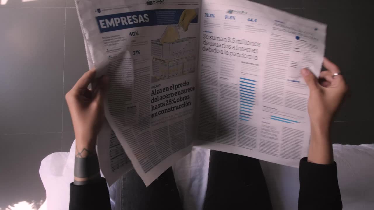 Video Stock Pov Flipping Through A Newspaper Live Wallpaper Free