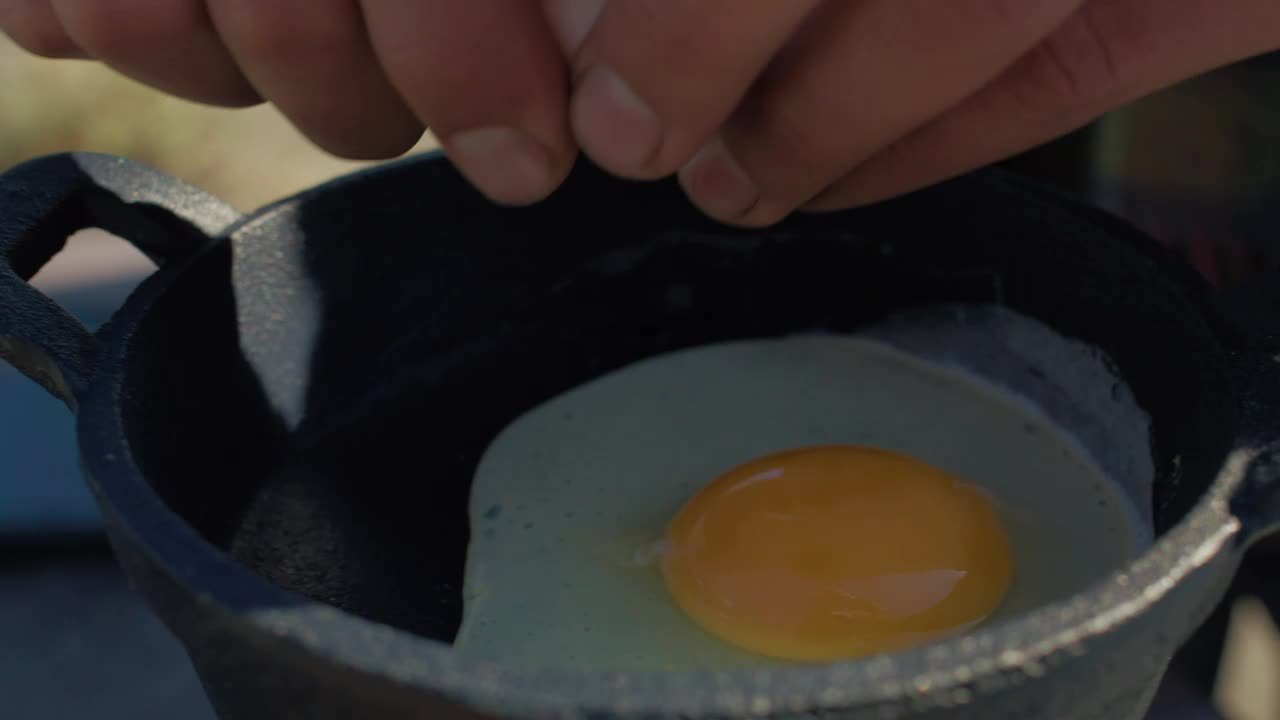 Video Stock Preparing Eggs At A Campsite Live Wallpaper Free