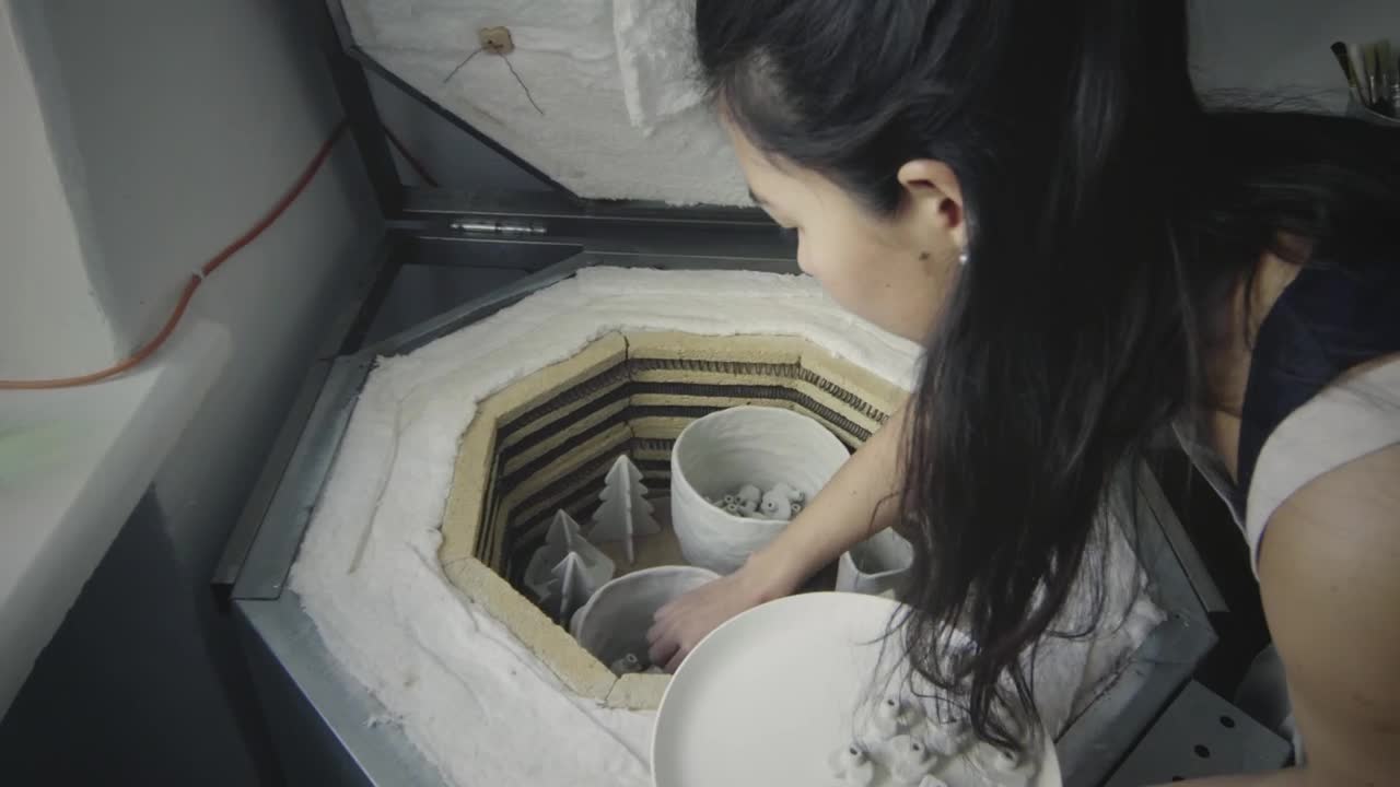 Video Stock Putting Ceramic Clay Objects In The Oven Live Wallpaper Free