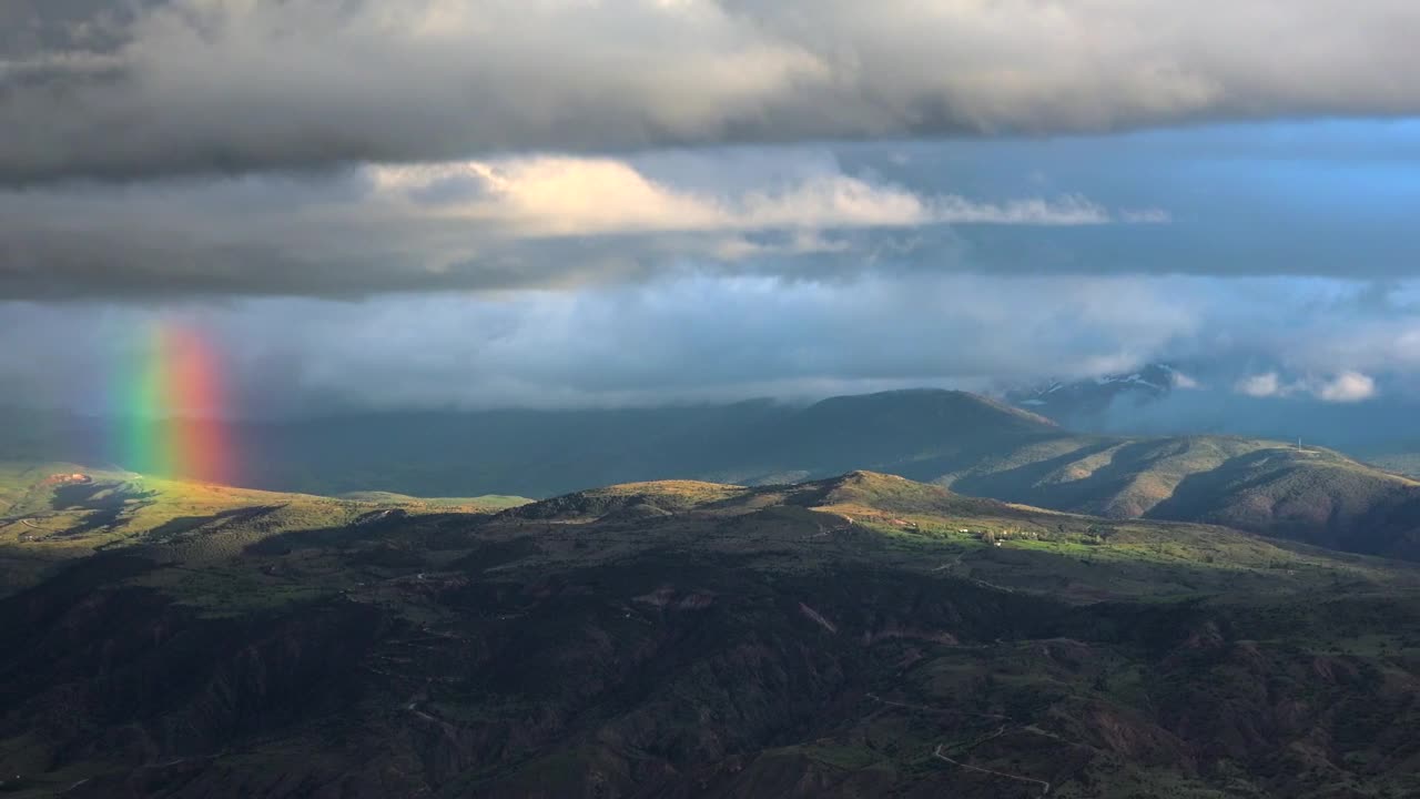 Video Stock Rainbow In The Peak Of A Mountain Live Wallpaper Free