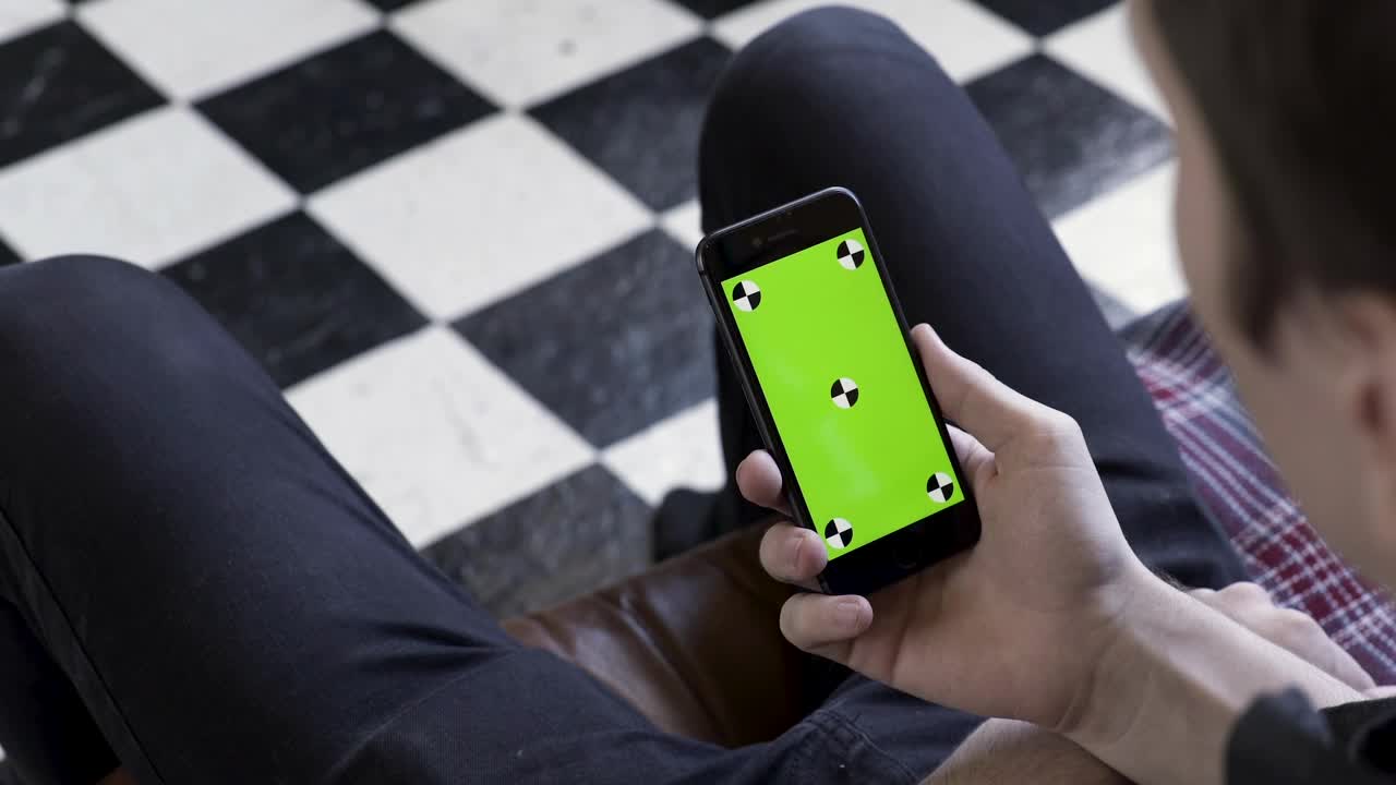 Free Stock Video Sitting Down With A Smartphone Live Wallpaper