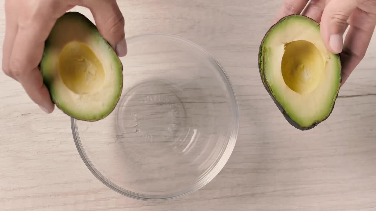 Free Stock Video Removing The Peel From An Avocado Live Wallpaper