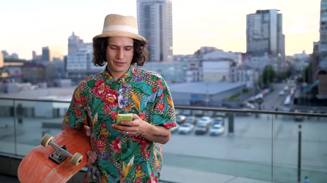 Free Video Stock Skater Checking His Phone Live Wallpaper