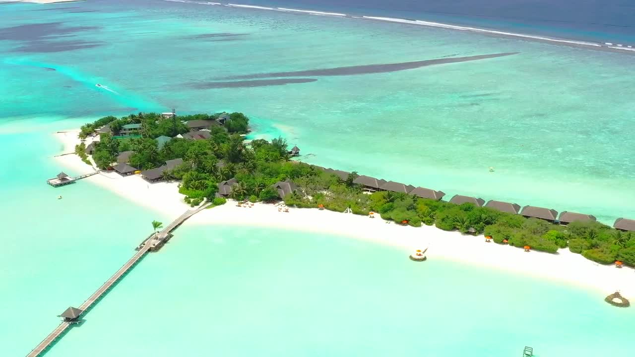 Free Video Stock Small Island Surrounded By Turquoise Sea Live Wallpaper