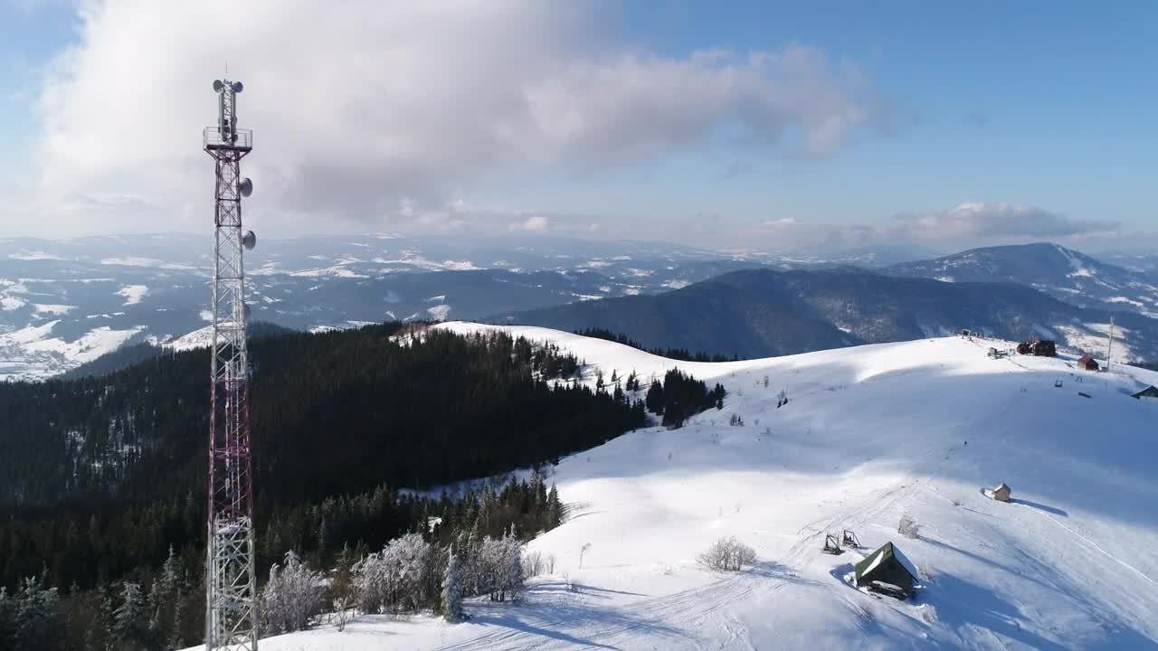 Free Video Stock tall telecommunication tower in the snow Live Wallpaper