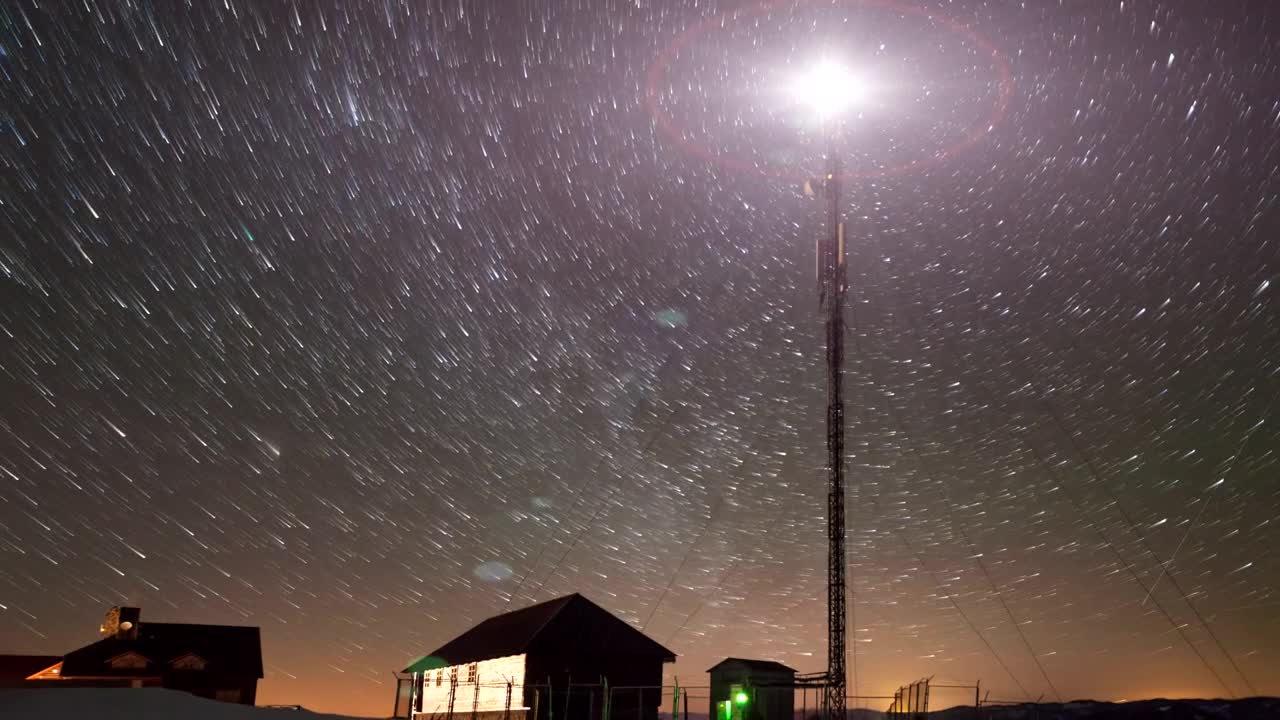 Free Video Stock time lapse of the moving stars and a tower Live Wallpaper