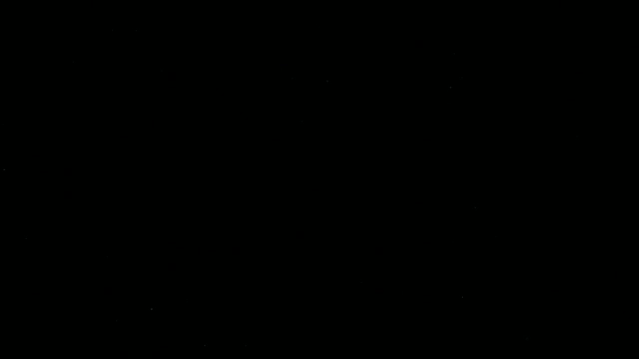 Free Video Stock tiny snow flakes on a black background Live Wallpaper