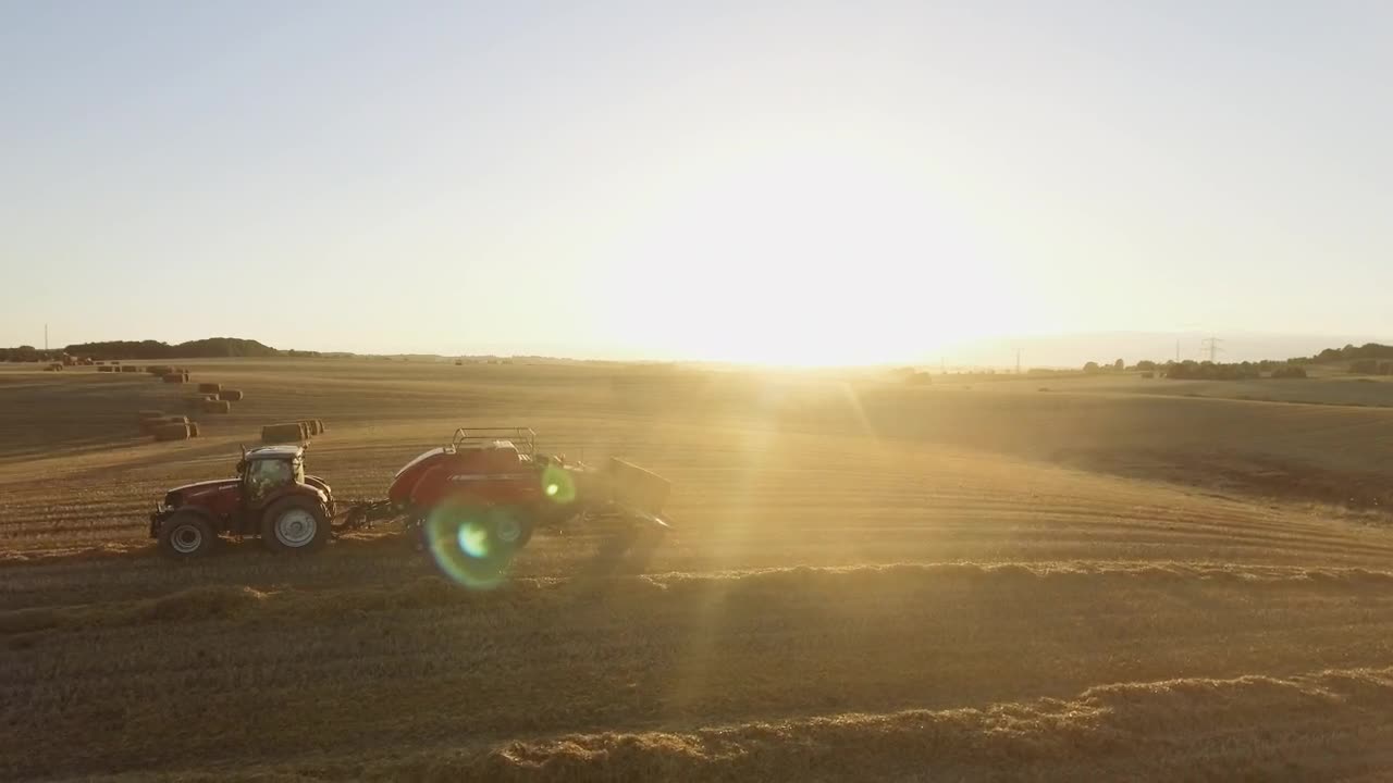 Free Video Stock tractor working on a farm Live Wallpaper