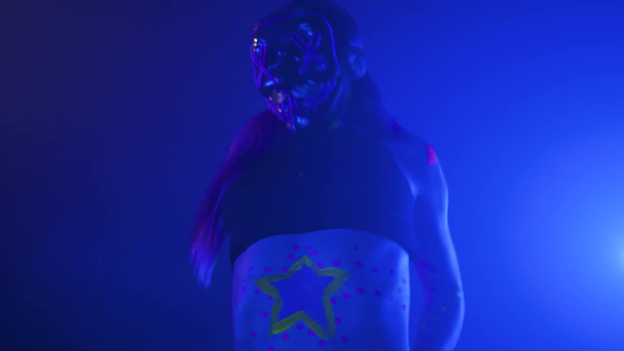 Free Stock Video Urban Girl Dancing With A Neon Mask Under A Party Live Wallpaper