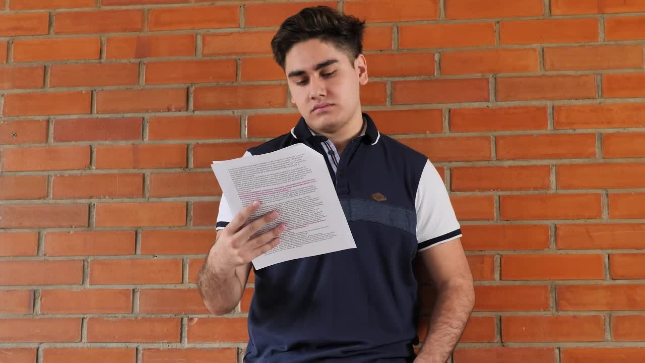 Free Stock Video Young Man Studying In The Corridors Of His School Live Wallpaper