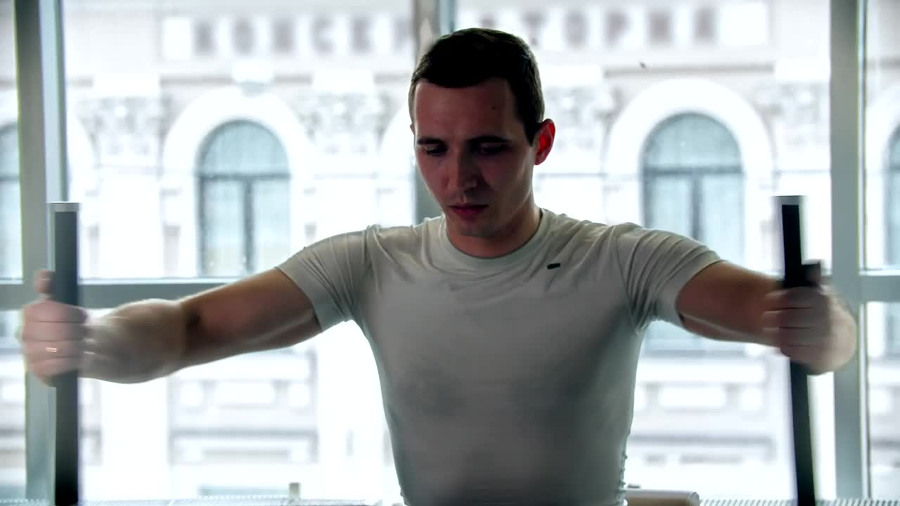Free Stock Video Young Man Doing Exercises With The Gym Equipment Live Wallpaper
