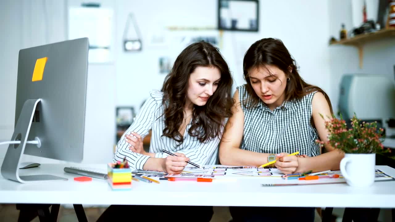 Free Stock Video Young Architects Working On A Blueprint With Pencils Live Wallpaper