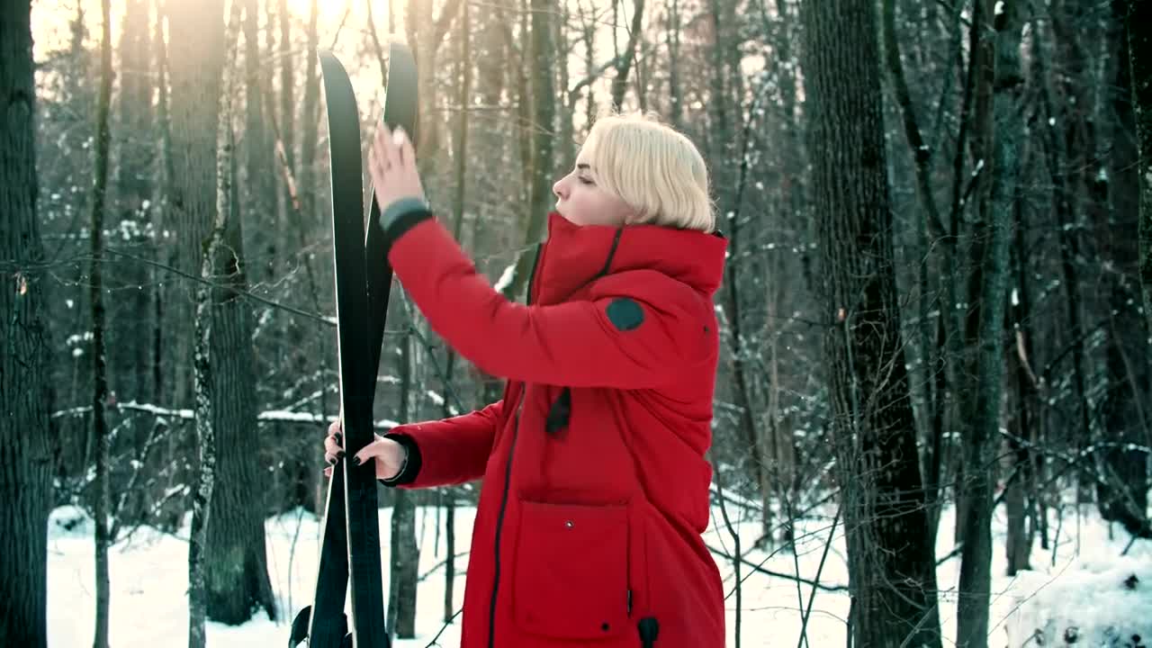 Free Stock Video Woman Removing Snow From Her Ski Live Wallpaper