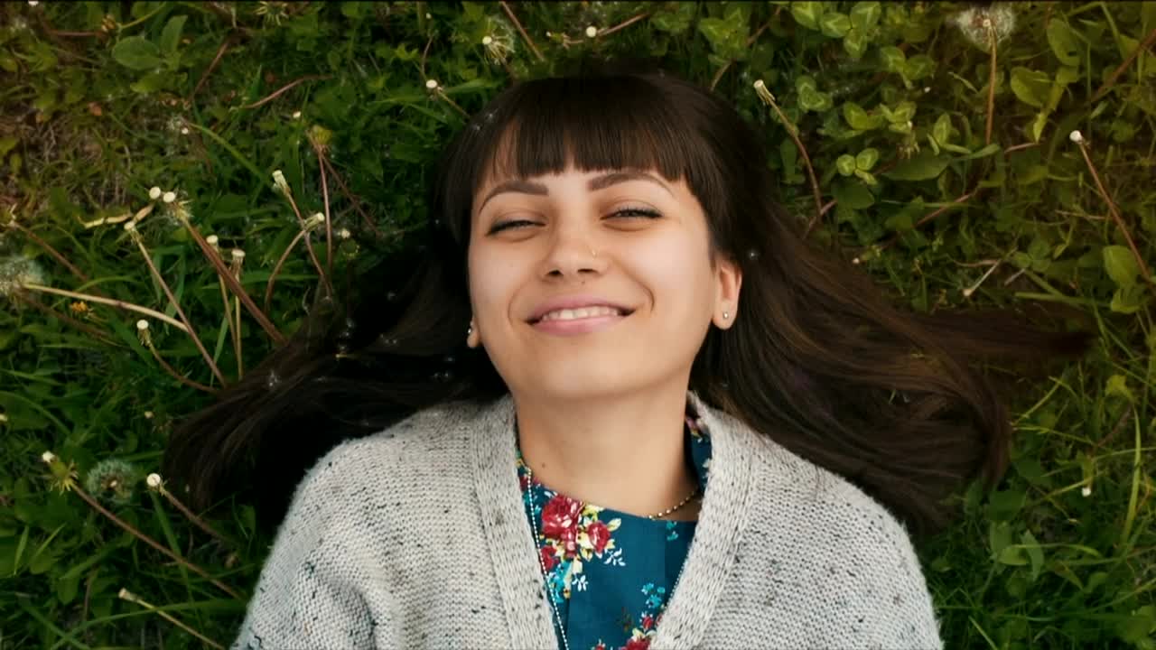 Free Stock Video Woman Lying In Nature Asks For A Hug Live Wallpaper