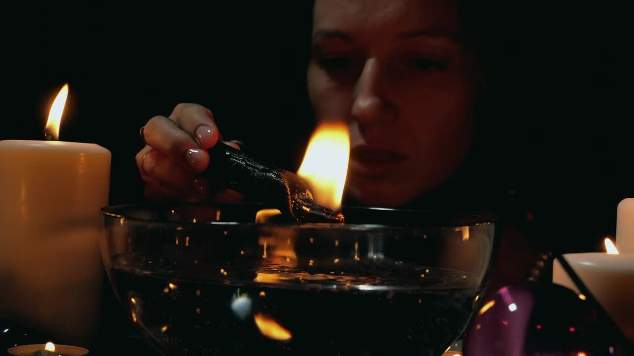 Free Stock Video Woman Doing A Ritual With A Candle Live Wallpaper