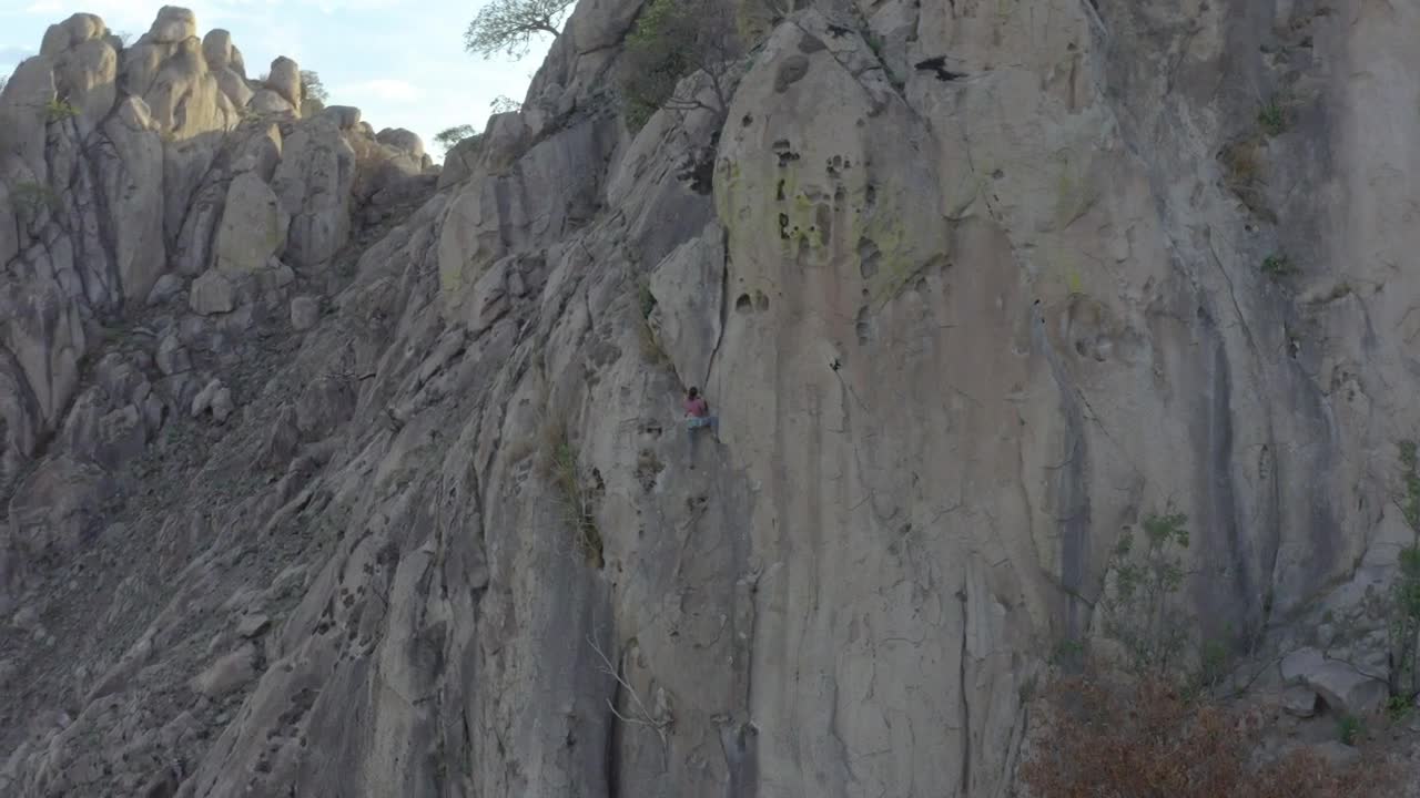 Free Stock Video Woman Climbing A Gigantic Rocky Mountain Live Wallpaper