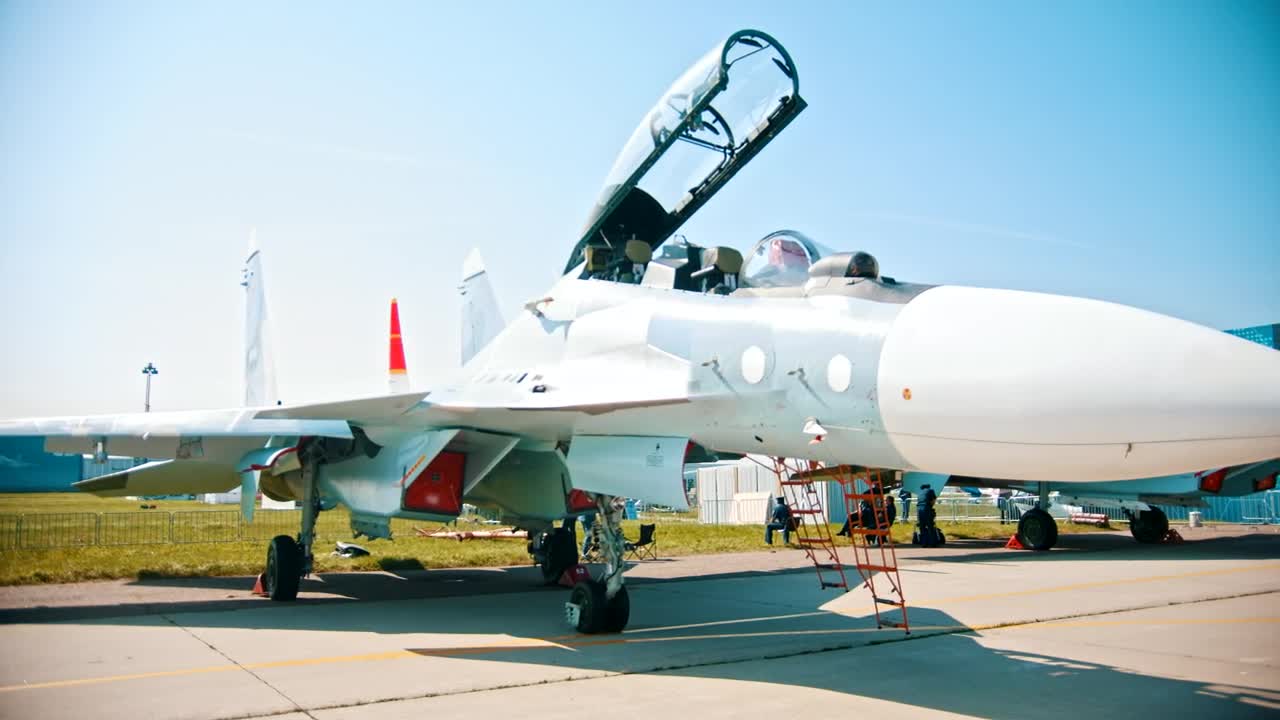 Free Stock Video White Jet Parked On A Runway In The Sun Live Wallpaper