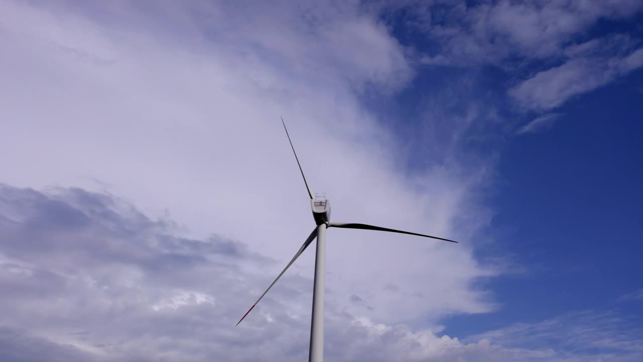   Stock Footage Wind Turbine Off Under A Cloudy Sky Live Wallpaper