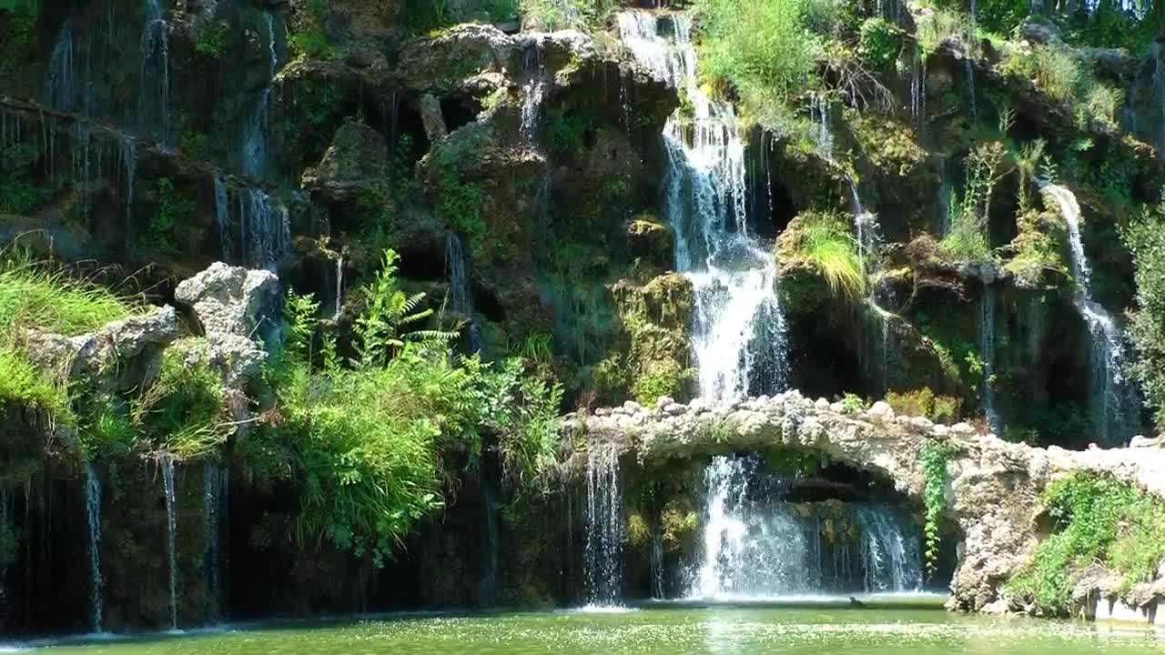   Stock Footage Waterfalls On A Beautiful Lake Live Wallpaper