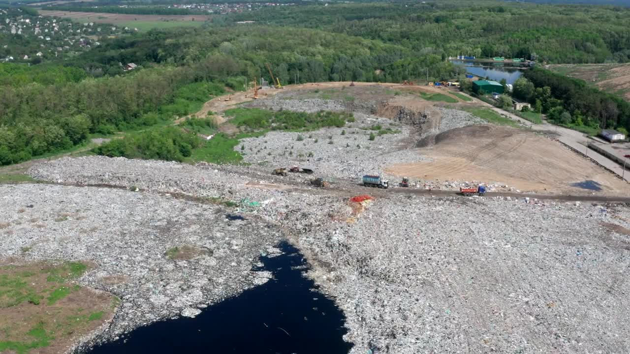   Stock Footage Waste Removal Trucks Working At A Landfill Live Wallpaper