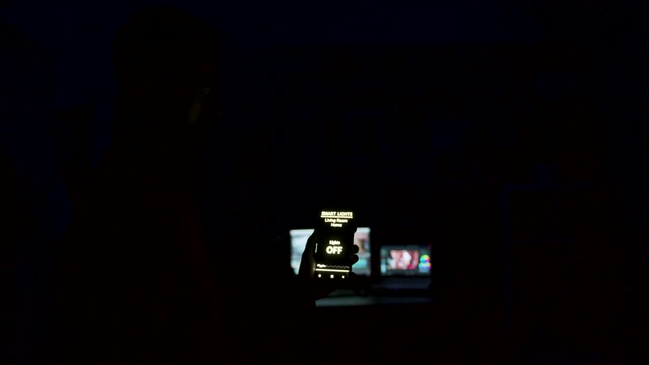   Stock Footage Using Future Mobile App To Control Home Lights Live Wallpaper