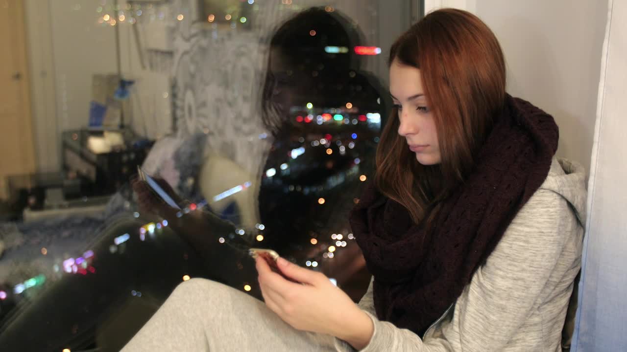  Stock Footage Using A Smartphone By The Window Live Wallpaper