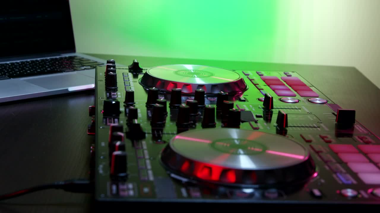   Stock Footage Using A Mixing Table And A Laptop Live Wallpaper
