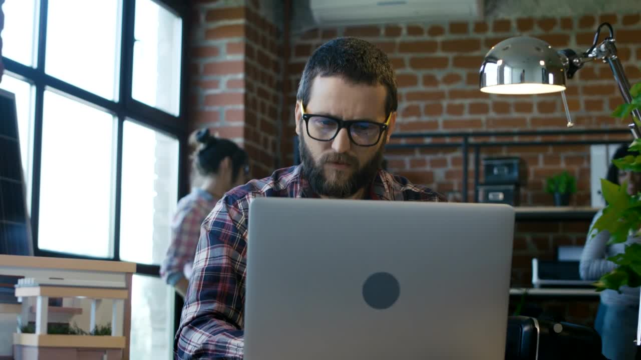   Stock Footage Upset Man Announcing Bad News To Coworkers Live Wallpaper