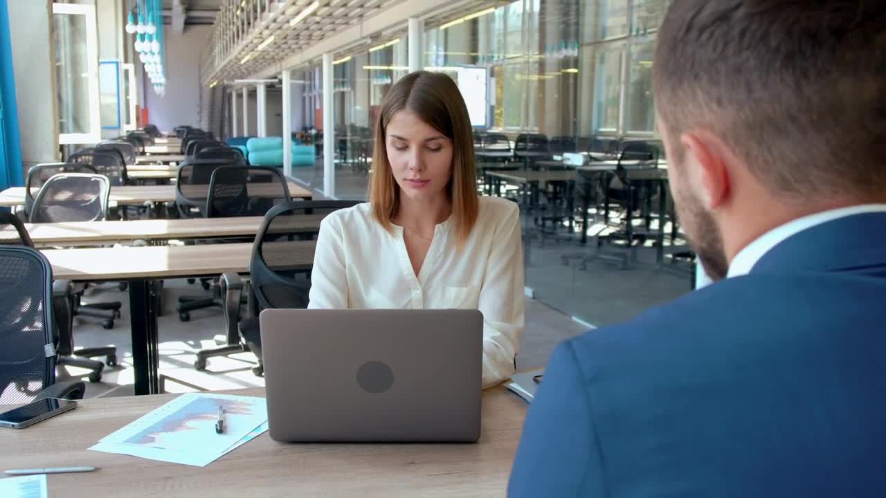   Stock Footage Two People Working In A Large Office Live Wallpaper