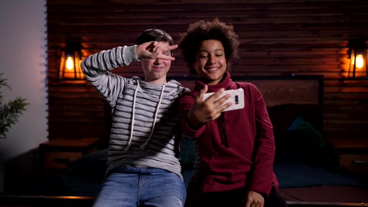   Stock Footage Two Friends Playing With A Phone Camera Live Wallpaper