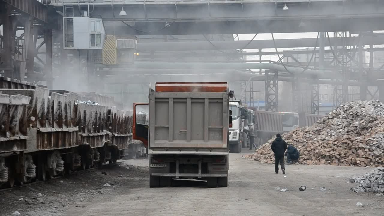   Stock Footage Trucks Parked Inside A Processing Plant Live Wallpaper