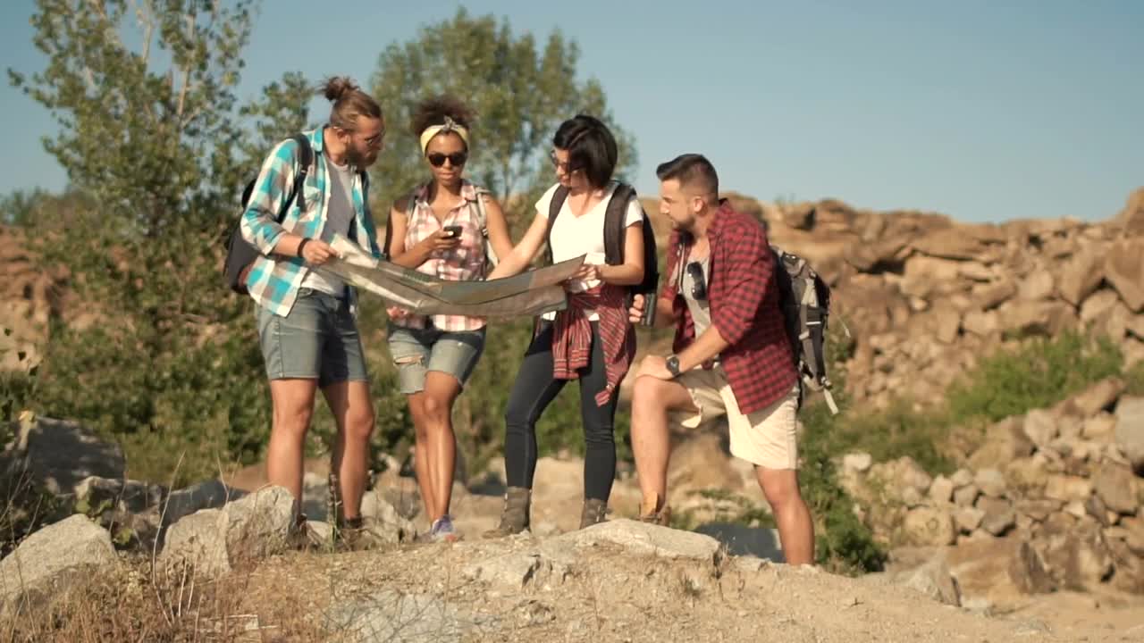   Stock Footage Travelers Watching The Map In The Wild Live Wallpaper