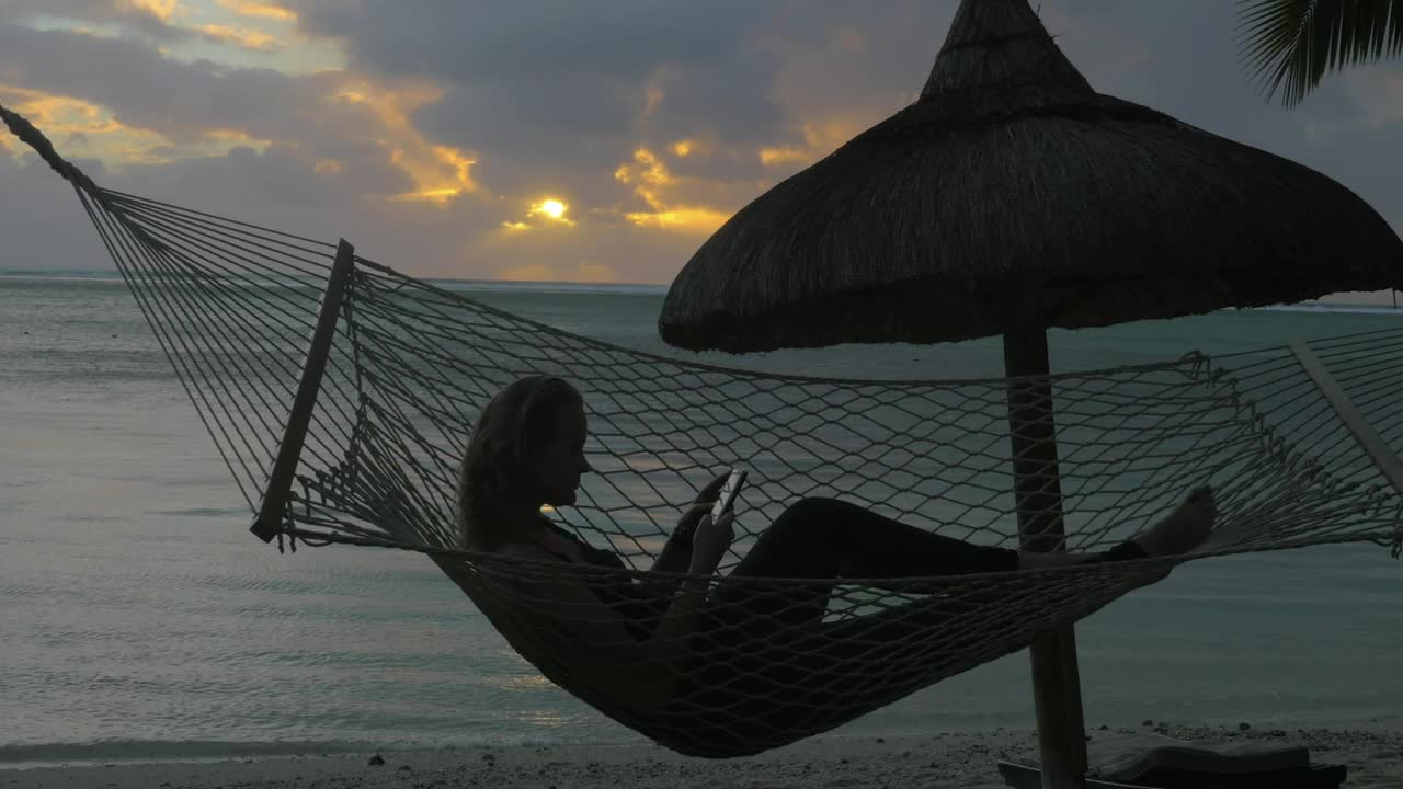 Stock Footage Woman Relaxing In A Hammock Live Wallpaper Free
