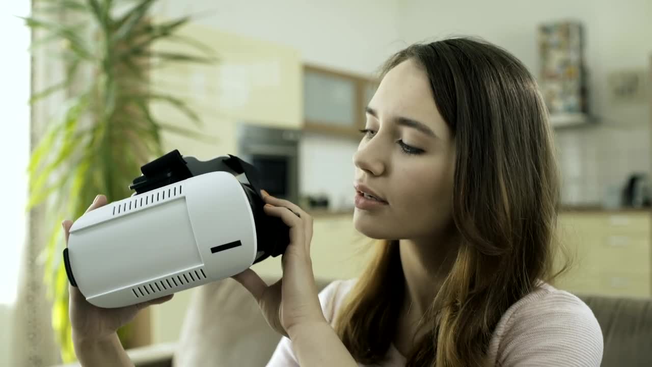 Stock Footage Woman Tries Virtual Reality At Home Live Wallpaper Free