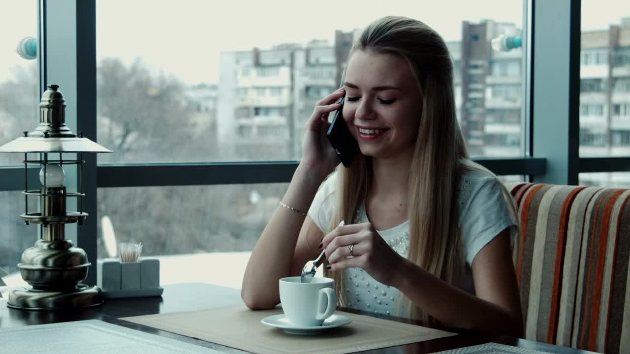 Stock Footage Woman Talking On The Phone In The Coffee Shop Live Wallpaper Free