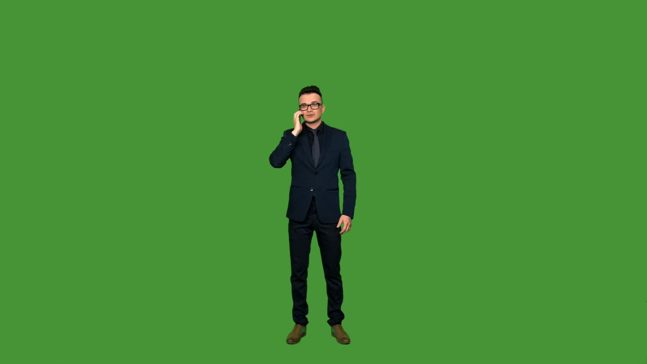 Stock Footage Young Man In A Suit Answering A Phone Call Live Wallpaper Free
