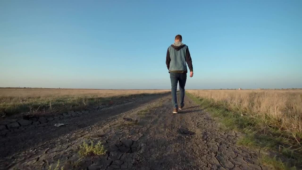 Stock Footage Young Man Walking In A Rural Path Live Wallpaper Free