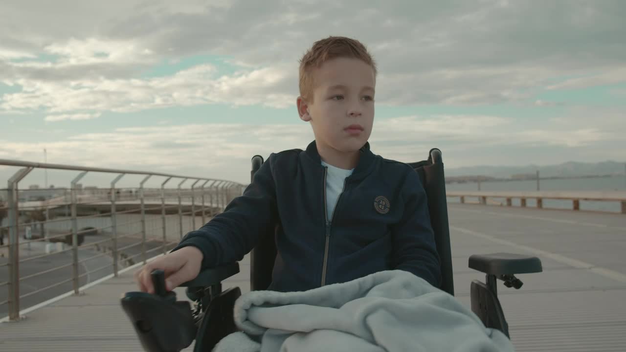Stock Footage Young Boy In An Electric Wheelchair Live Wallpaper Free