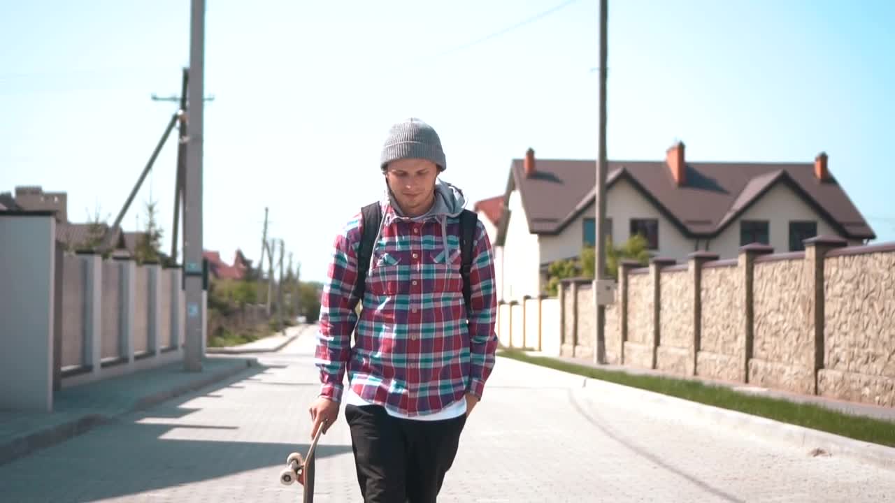 Stock Footage Young Skateboarder On A Board In The Street Live Wallpaper Free
