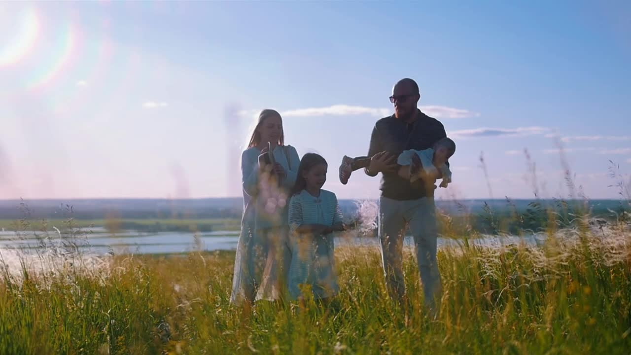 Stock Footage Young Family Enjoying The Sun At The Valley Live Wallpaper Free