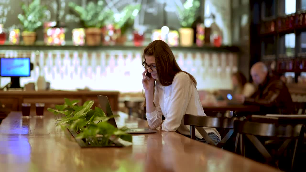 Stock Footage Young Businesswoman Working In The Coffee Shop Live Wallpaper Free