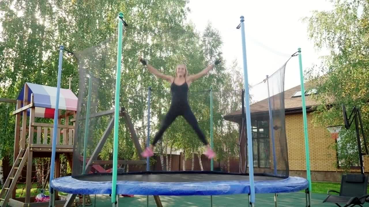 Stock Footage Woman Jumping On A Small Trampoline Live Wallpaper Free