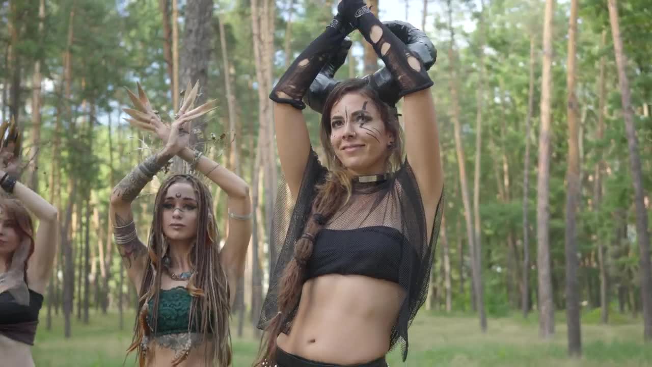 Stock Footage Woman In Fantasy Costumes Belly Dance In Woods Live Wallpaper Free